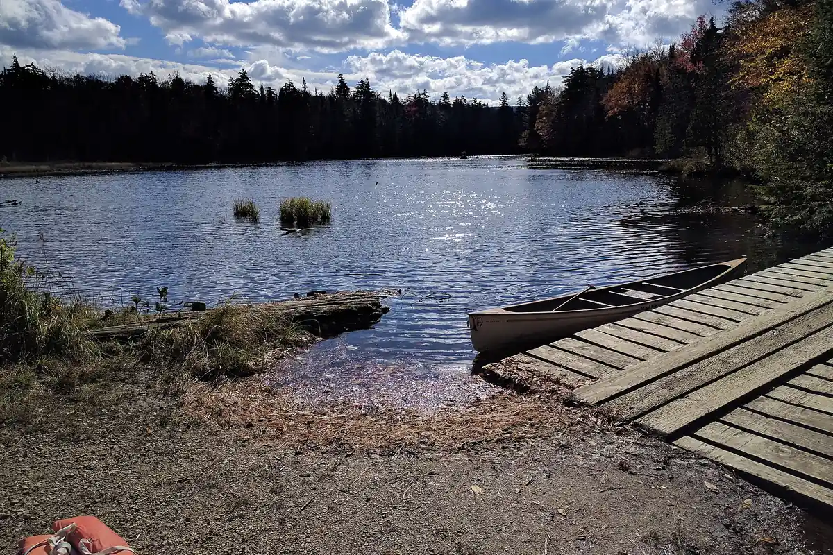 Forest campground beside a lake in the Adirondack Mountains - Adirondack Mountains | KnowOutdoor