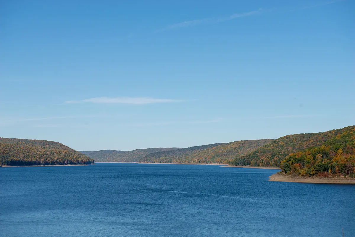 Allegheny Reservoir viewed through autumn foliage - Allegheny National Forest | KnowOutdoor