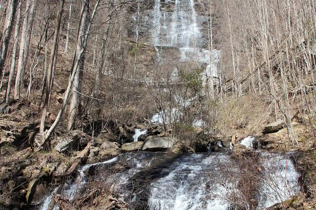 Amicalola Falls viewed through the forest from a lower trail - Amicalola Falls State Park | KnowOutdoor
