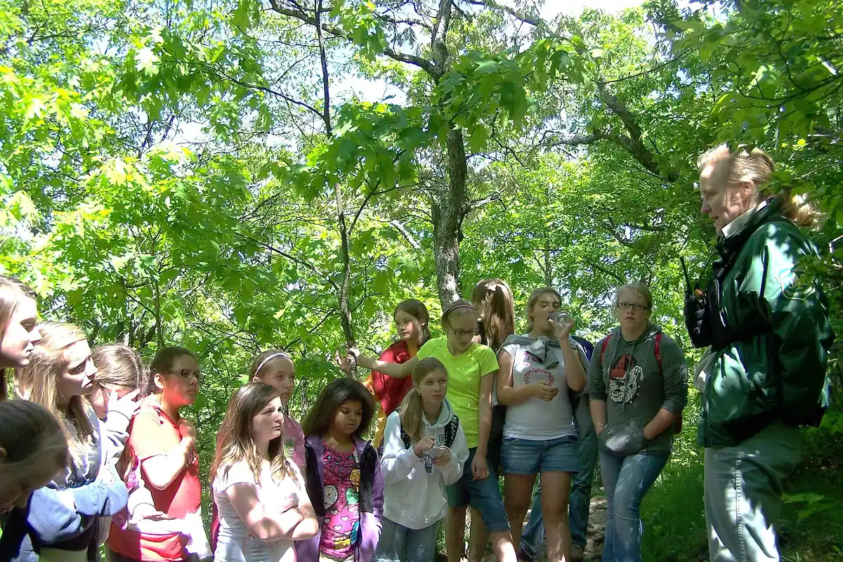 Group hiking toward Springer Mountain in north Georgia - Appalachian Approach | KnowOutdoor