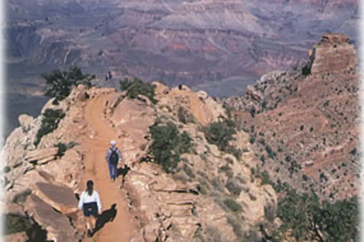 Hikers descending the exposed South Kaibab Trail in Grand Canyon National Park