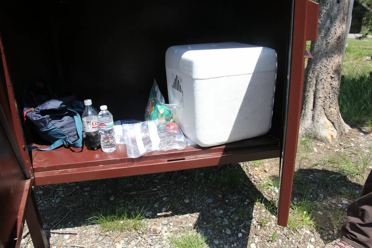 Food and coolers stored inside a bear-resistant locker at String Lake in Grand Teton National Park