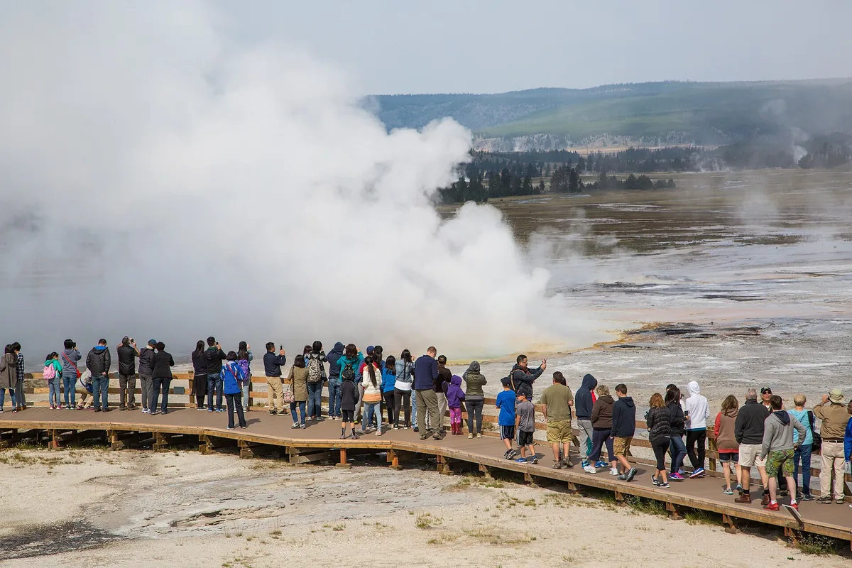 Boardwalk crossing a hydrothermal basin in Yellowstone National Park - Yellowstone National Park | KnowOutdoor