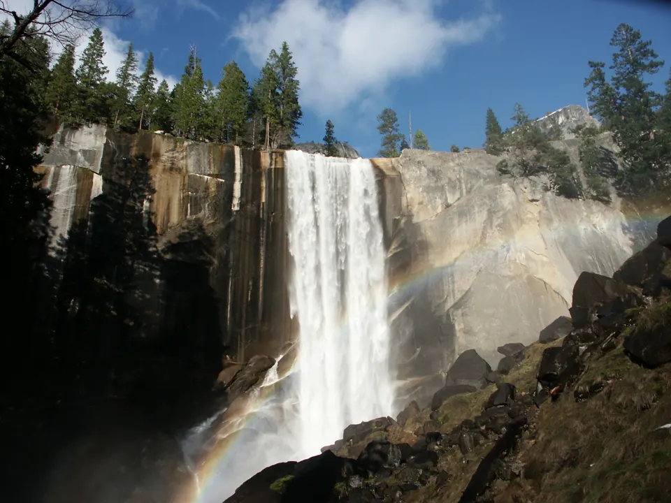 Vernal Fall drops over granite beside the Mist Trail - Yosemite National Park | KnowOutdoor
